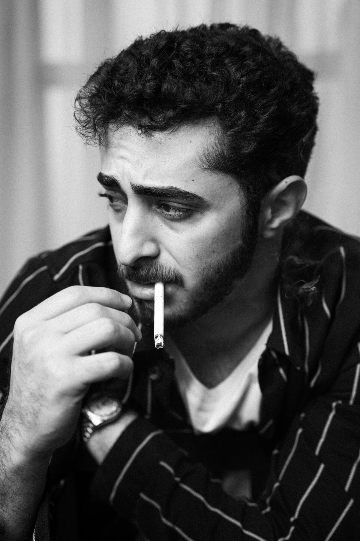 Man with a cigarette, black and white