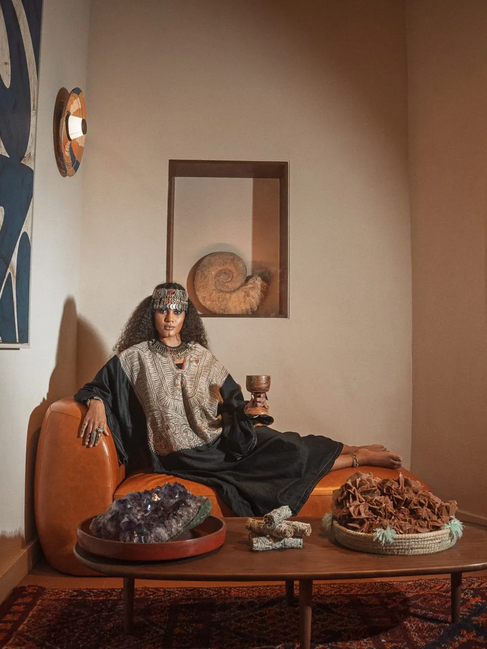 Man reclining in a traditional majlis