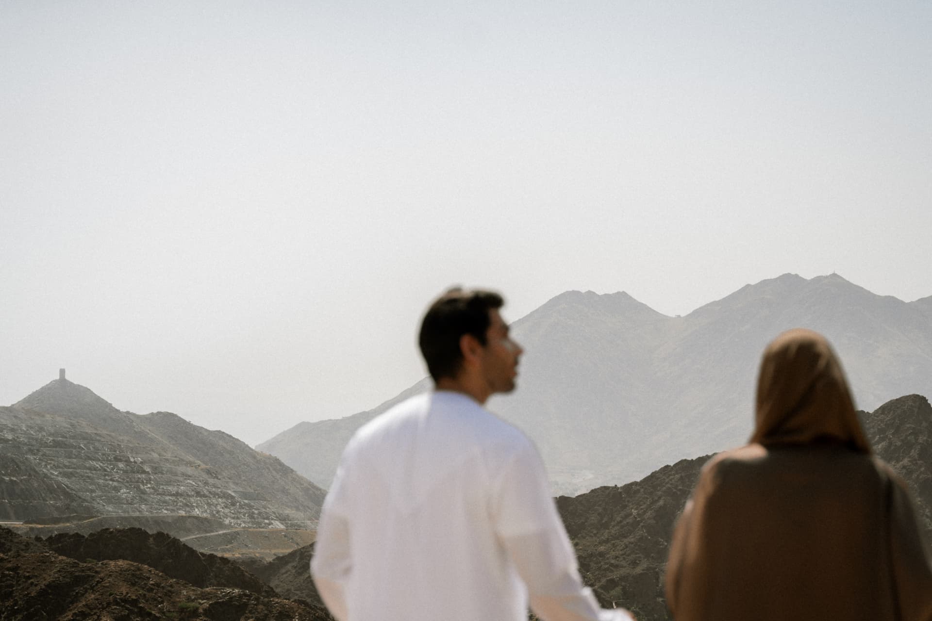 Couple looking out over the Hajar mountains
